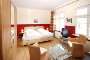 Гостиница Ferienwohnungen-Molli-West-Wohnung-2-9802  Кюлунгсборн